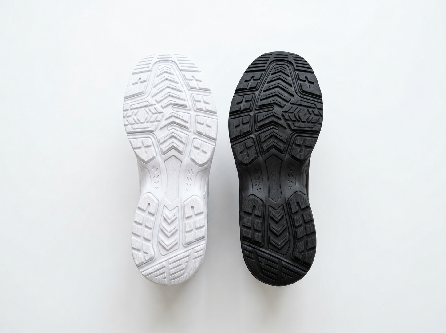 Sports shoe soles in different materials and styles